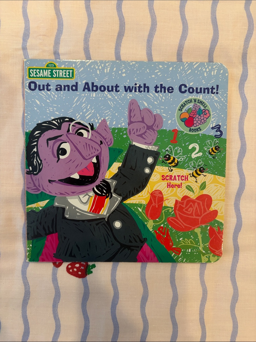 Sesame Street Out and About with the Count: Scratch and Smell Board Book 🍇🍎🍊